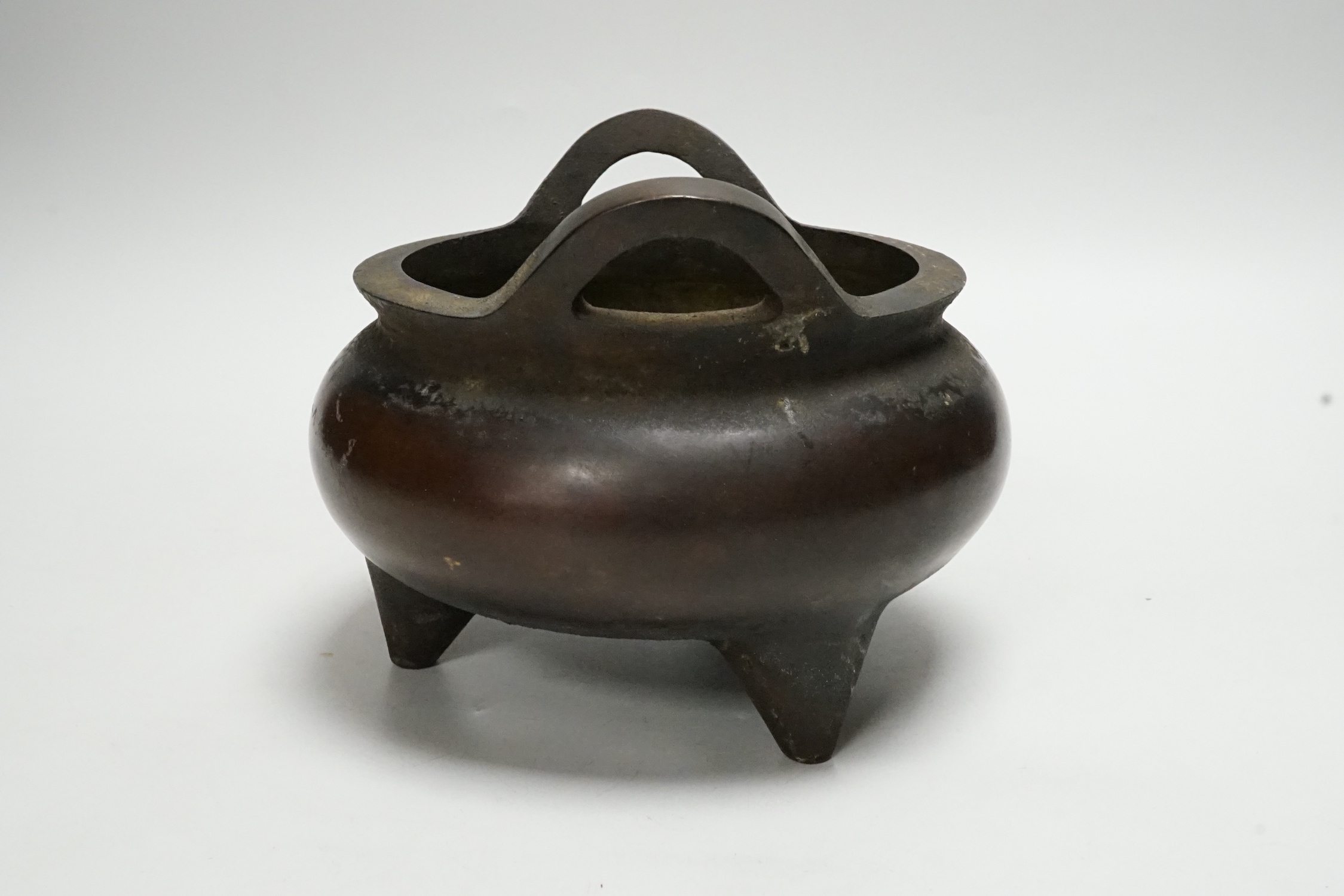 A Chinese bronze censer, ding, 13.5cm tall